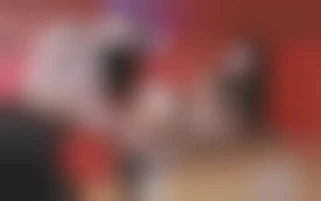 Two horny lesbian girls and a silver dildo in a night club