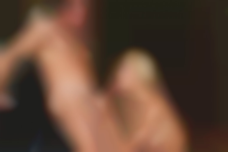 On the hood of a car in the undergrowth