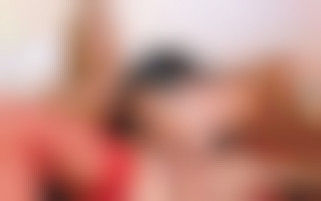 A blond Bimbo girl with big tits riding hard with a big cock in sexy red lingery