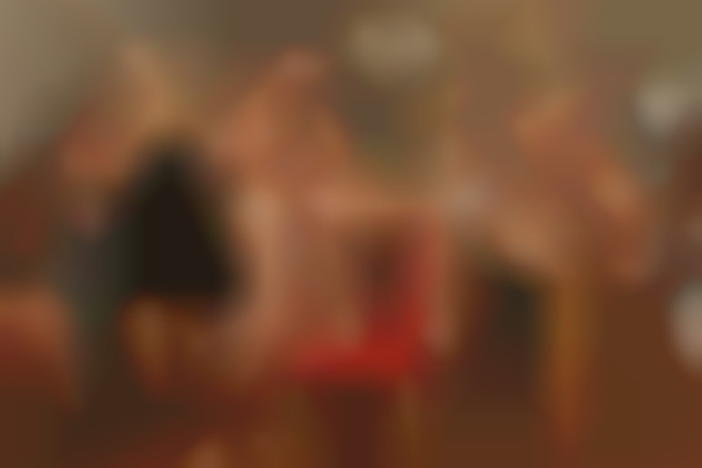 Two horny girls fucking hard on the table and in the middle of the guests in a very hot party