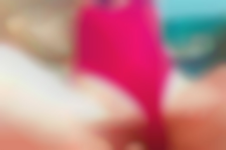 Beach bliss: red swimsuit seduction