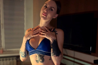 ...looking irresistible in her sexy lingerie.